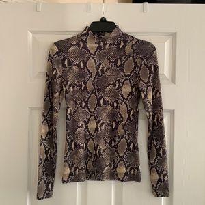 Snakeskin print women’s turtleneck